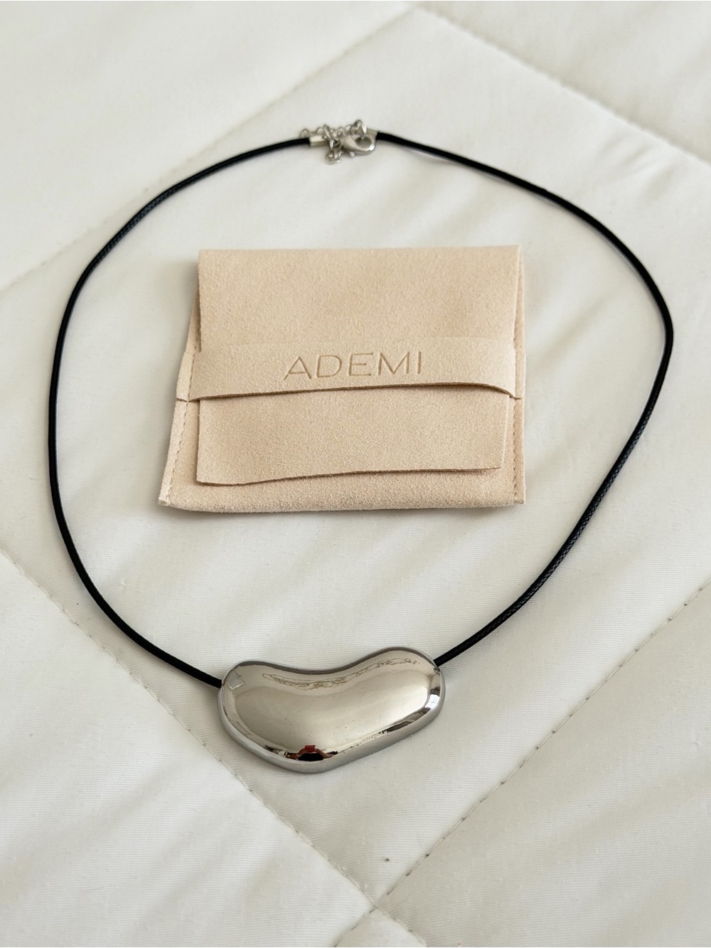 ADEMI Silver Bean Pendant Necklace on Black Cord